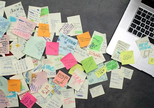 Take Notes and Follow Up Your Reminders lots of sticky notes